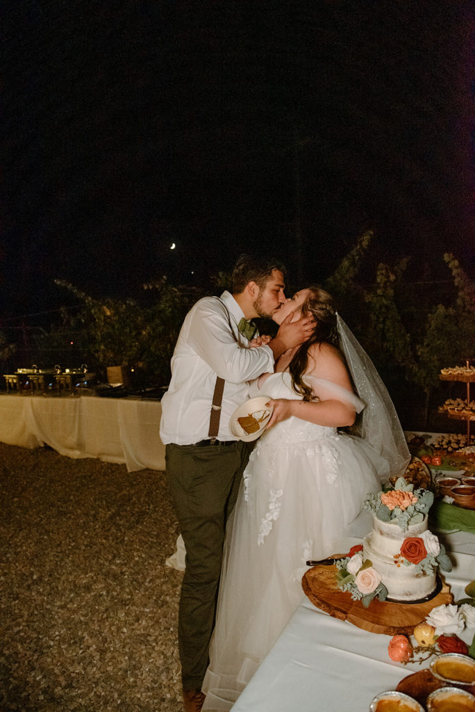 Sydney Jai Photography - Bride and groom wedding cake cutting, bride and groom kissing, rustic wedding cake