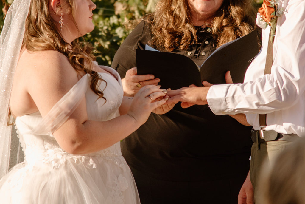 Sydney Jai Photography - Wedding ceremony, bride and groom exchanging rings