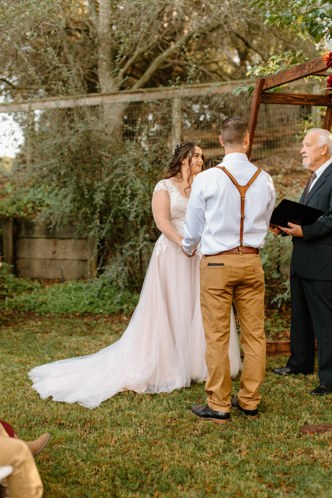 Sydney Jai Photography - wedding ceremony, bride and groom exchanging vows